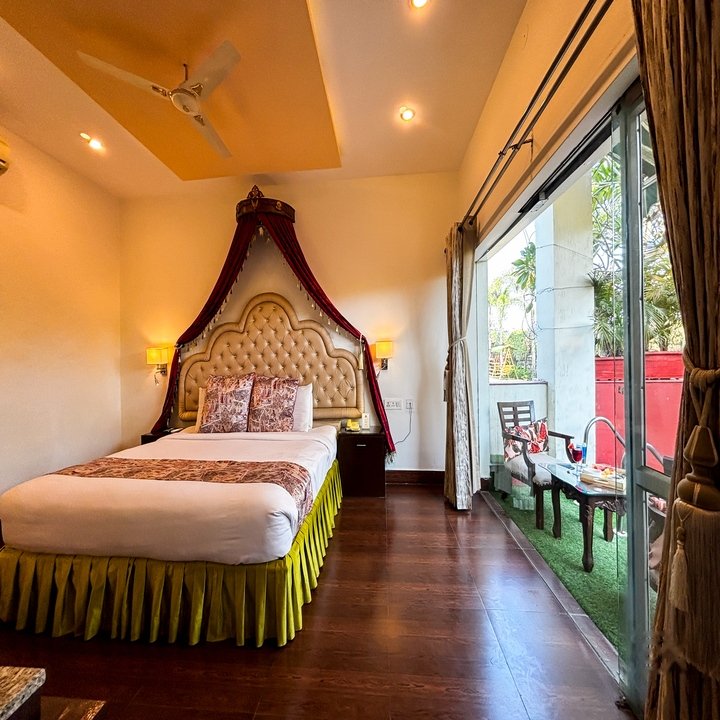 Bedroom with a garden-facing private patio